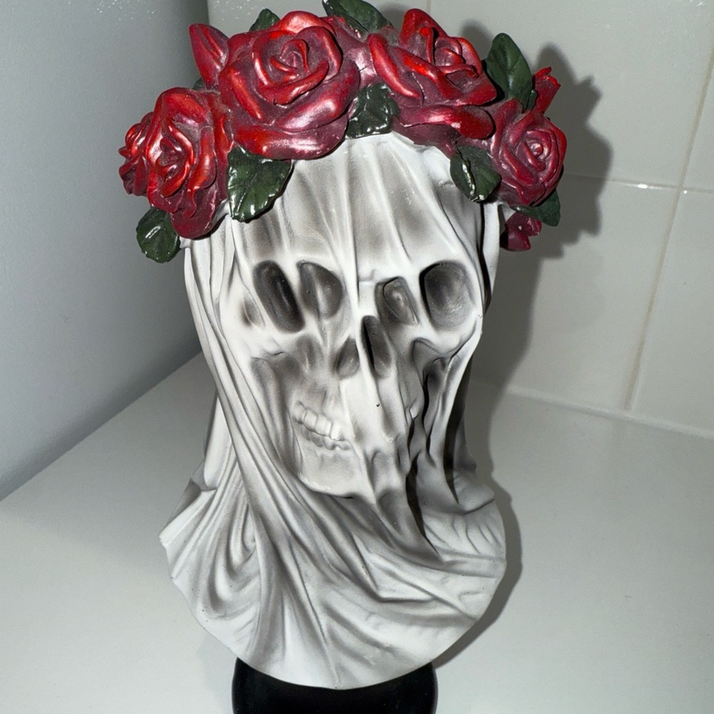 Skull Sculpture with Red Roses
